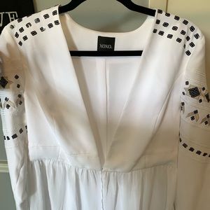 White sequined peplum style jacket